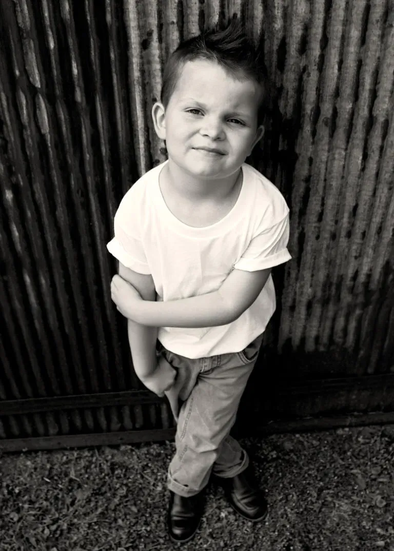 Classic 1950's style tough guy portrait of a child