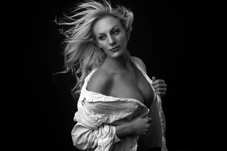 Candid unscripted moment of woman in white shirt
