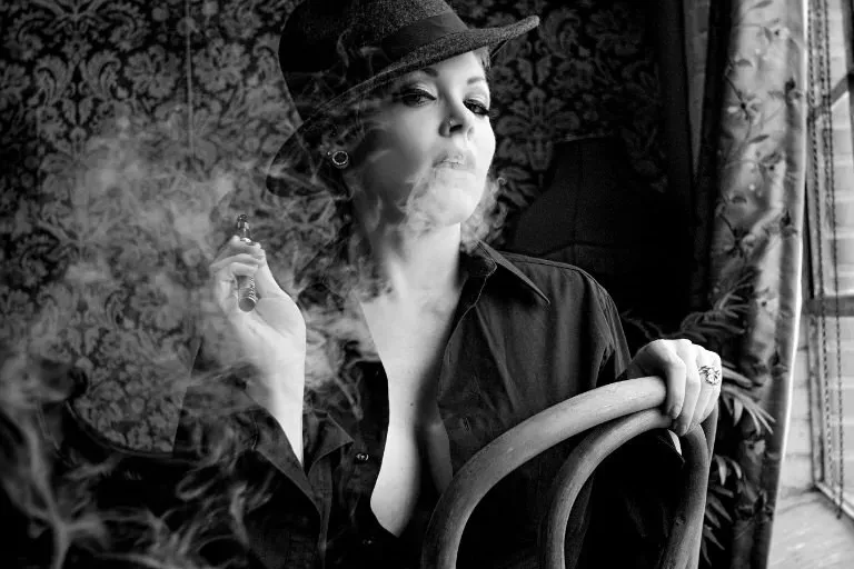 Candid portrait with atmospheric smoke in studio